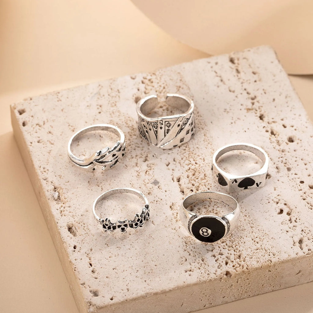 Black alloy women's ring with a detailed retro spade card design on its face.