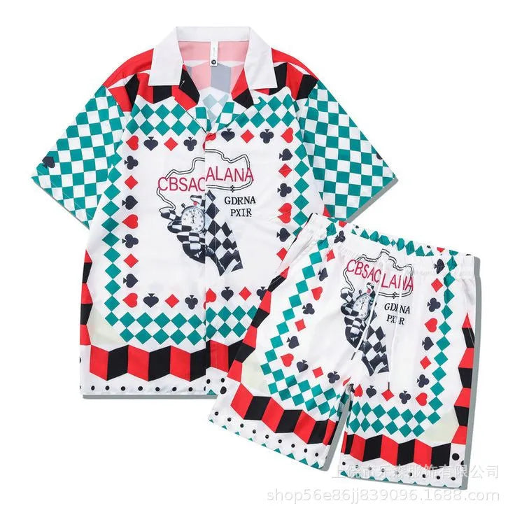 Men's plaid beach outfit with short sleeve shirt and matching trousers on hanger