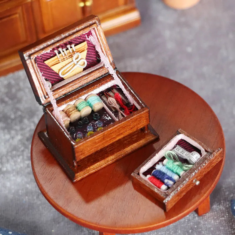 Miniature wooden sewing machine ornament with European-style design on display