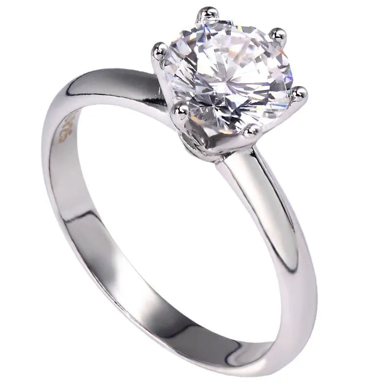 Six-claw inlaid zircon ring in white copper with electroplated white gold finish, geometric shape, unisex sizes No 4 to No 11.
