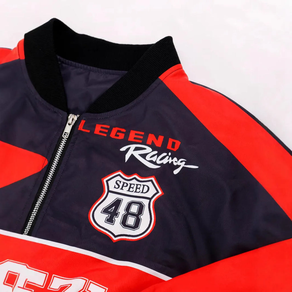 Women's loose fit zip-up jacket with geometric pattern in blue colour option showing front view