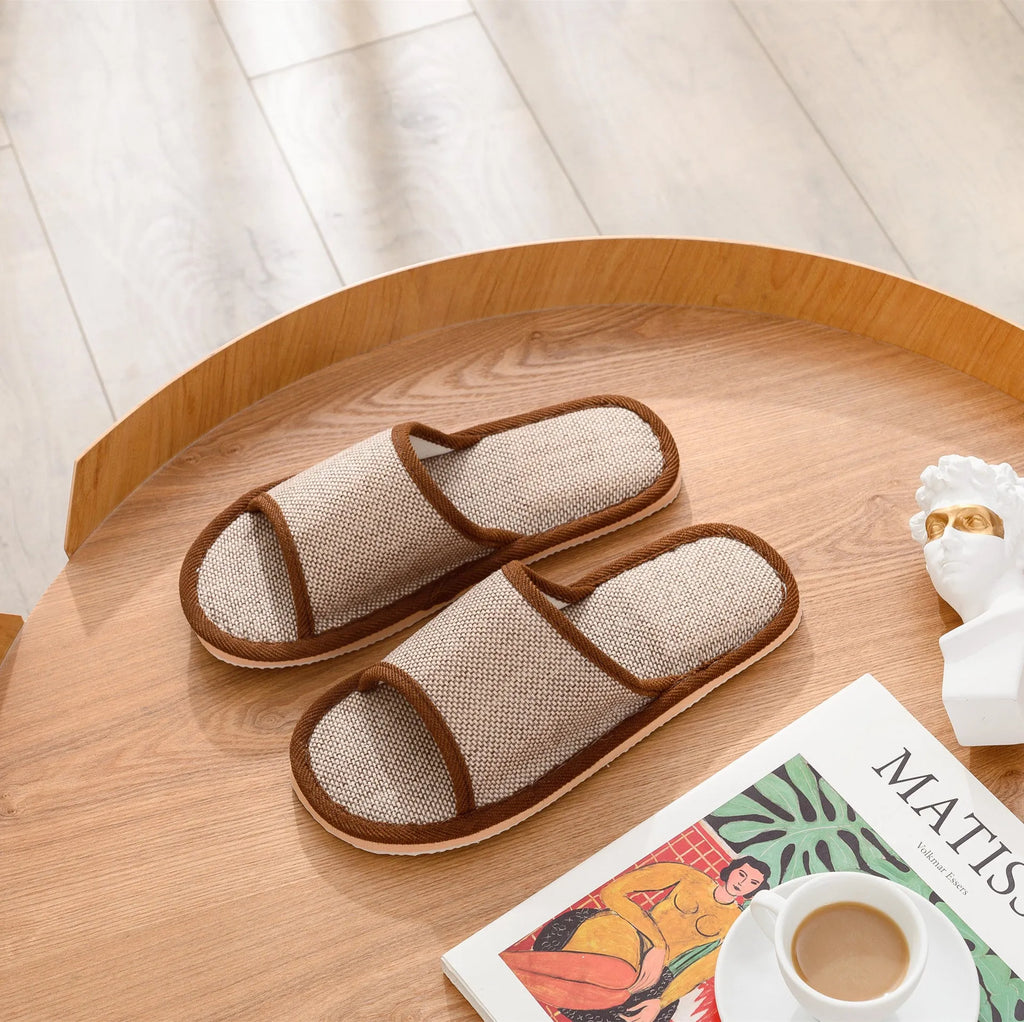 Women's open-toe linen slipper in a light brown colour, showing the breathable design and thickening sole.