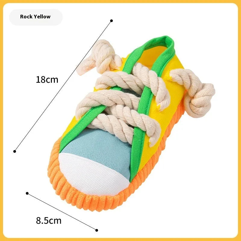 Plastic dog slippers toy in rock yellow, black, and sea fog blue colours with sound feature.