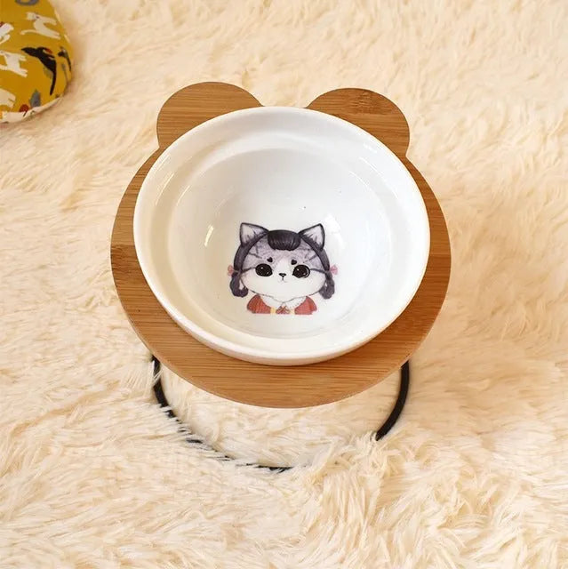 Ceramic cat bowl holder with raised rack in grey cat colour
