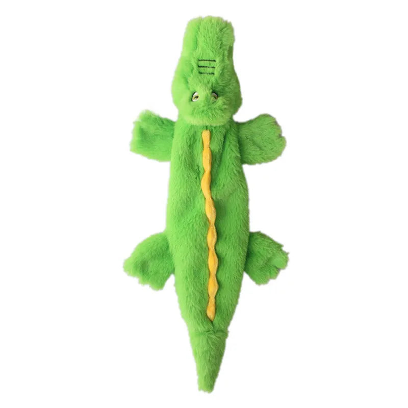 Green crocodile-shaped squeaky dog toy with crinkle paper tail for aggressive chewers
