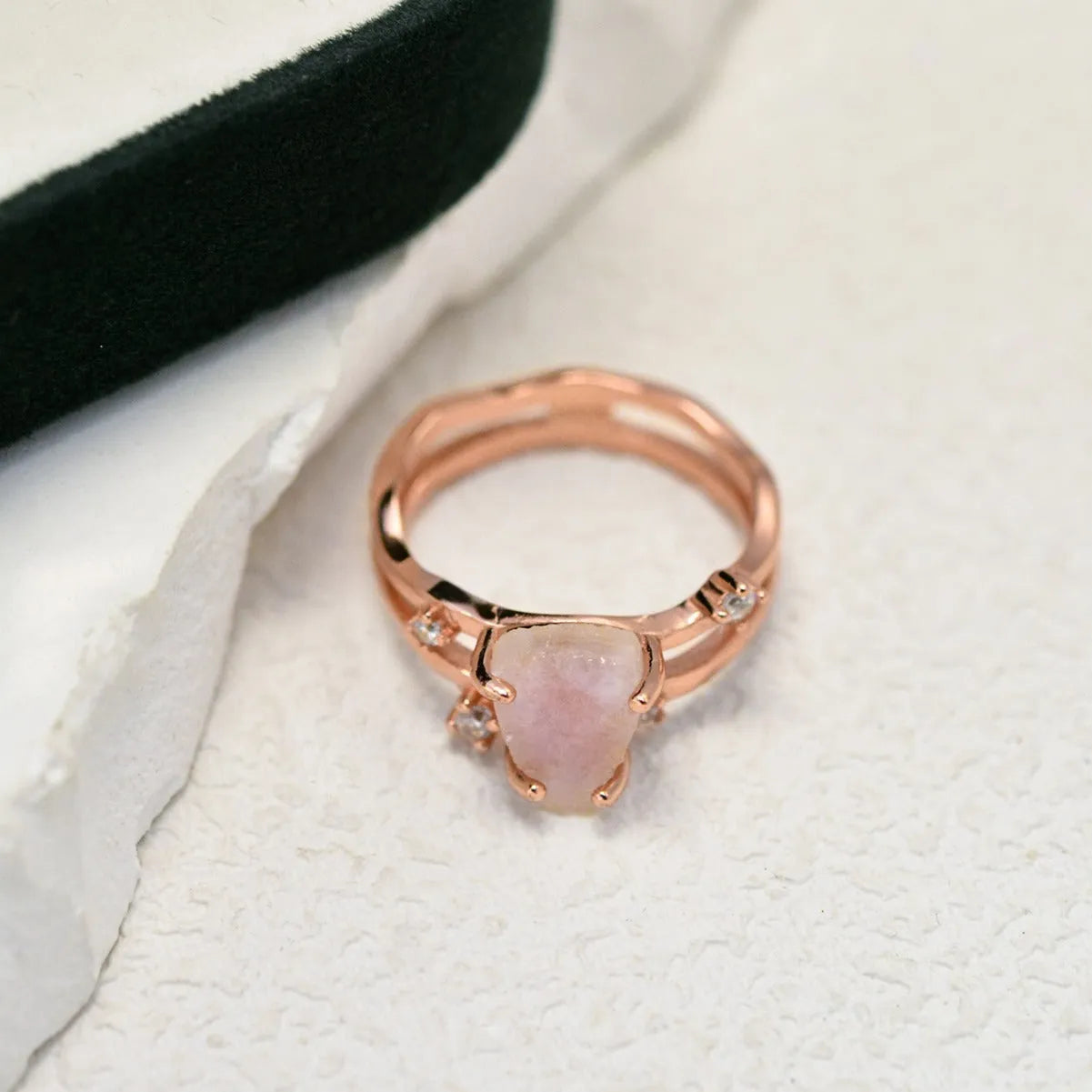 S925 silver irregular triangle moonstone ring in rose gold, white gold, or yellow gold colour on a hand.
