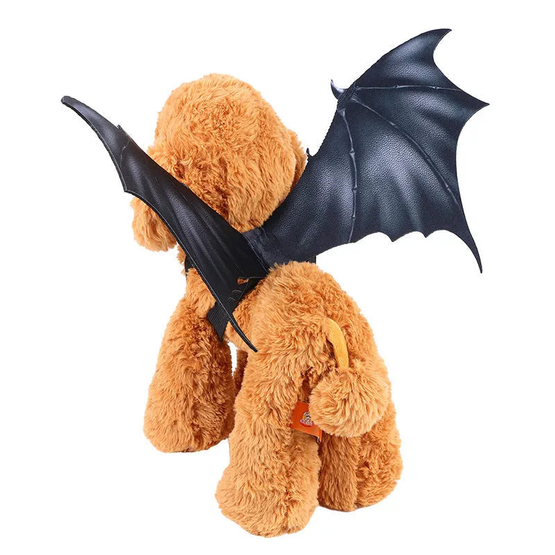 Black cloth bat wings pet costume for Halloween, showing three size options for cats and dogs