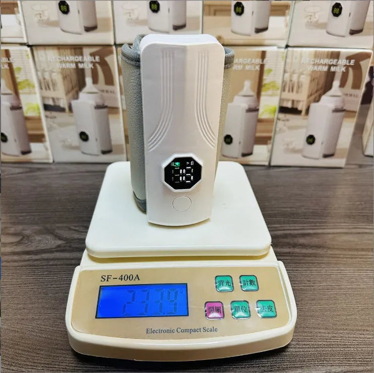 Grey and white car charger milk warmer for infant bottles with 12V power connection