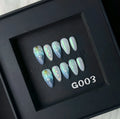 HAILANG blue plastic artificial nail tips set showing sizes XS, S, M, L for French manicure.