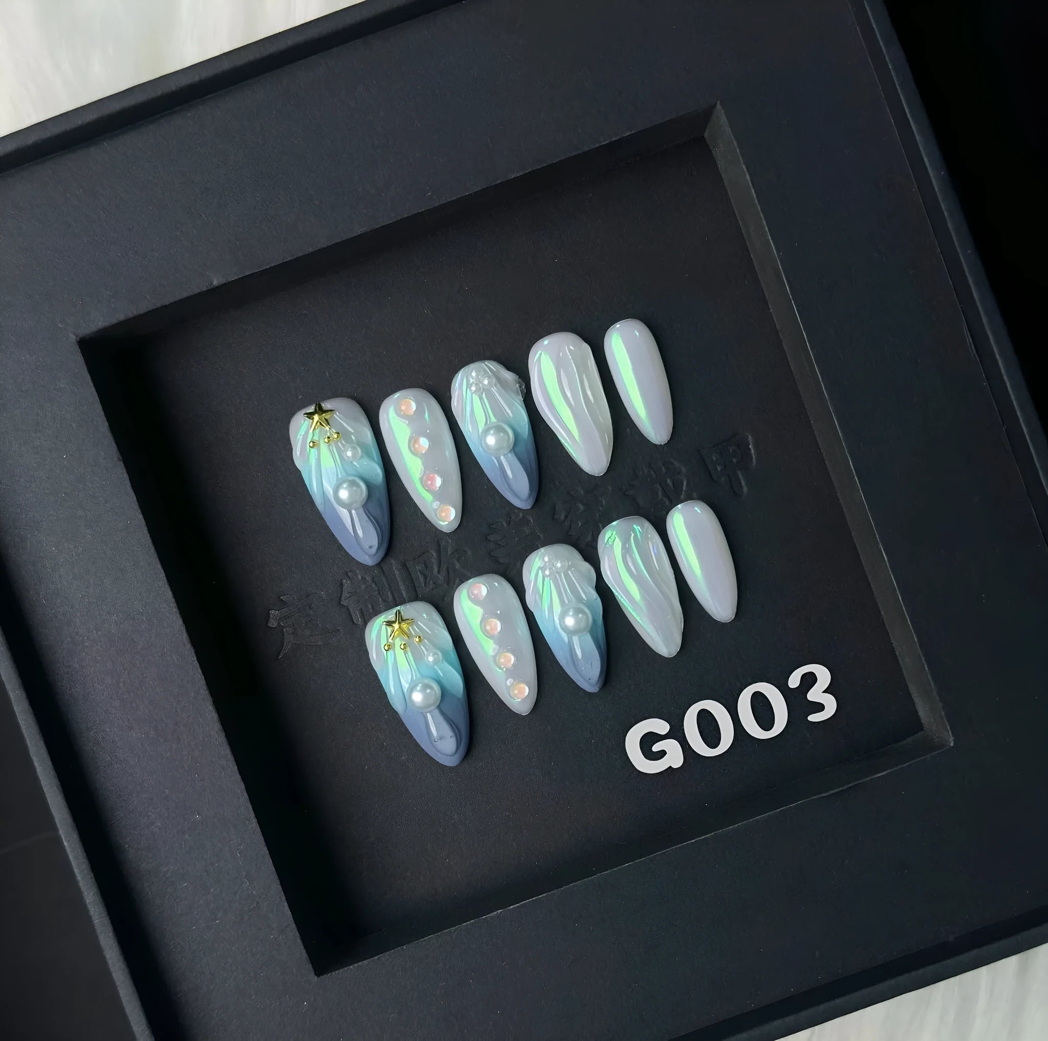 HAILANG blue plastic artificial nail tips set showing sizes XS, S, M, L for French manicure.