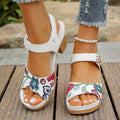 White women's high heel sandals with an adjustable Velcro strap buckle on the ankle.