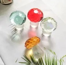 Small crystal mushroom decoration in modern geometric design, 40mm by 53mm.