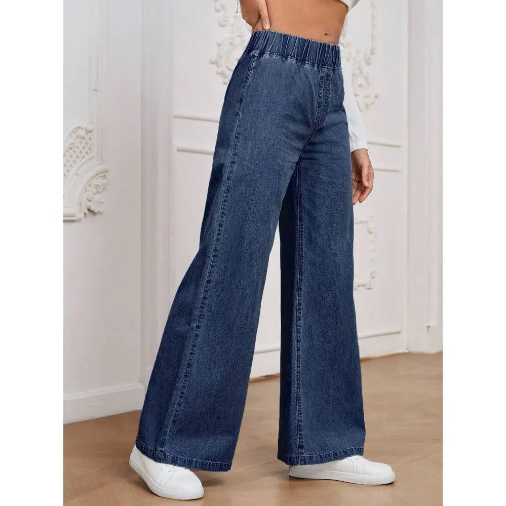 Light blue washed wide-leg plus size jeans with straight-leg design and zip fly