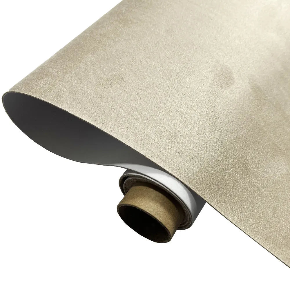 Roll of black self-adhesive leather suede material with a 0.5mm thickness for DIY projects.