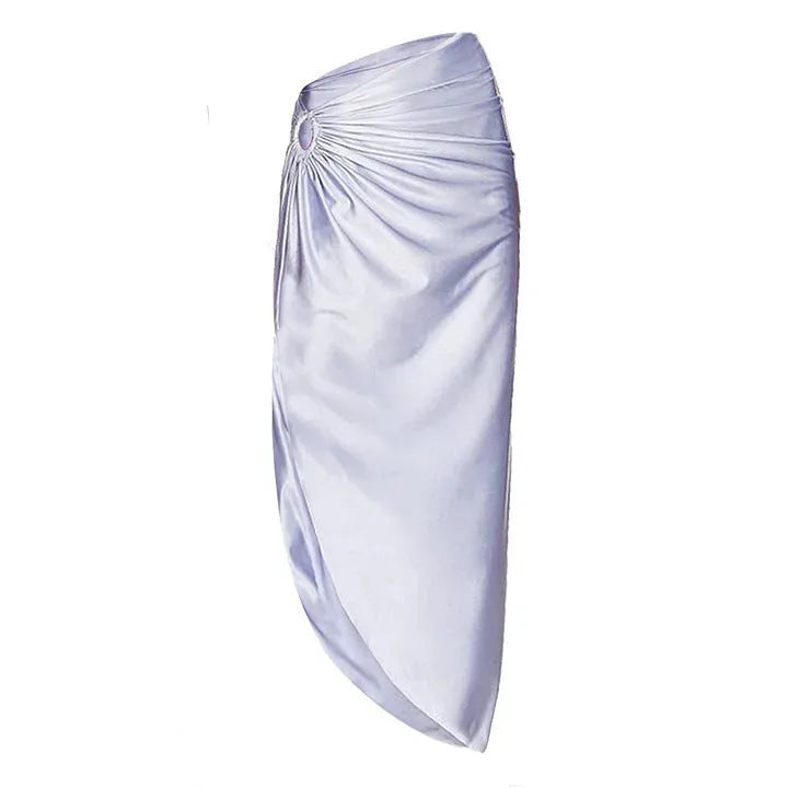 Purple one-piece swimsuit with a matching wrap skirt laid flat on a surface.
