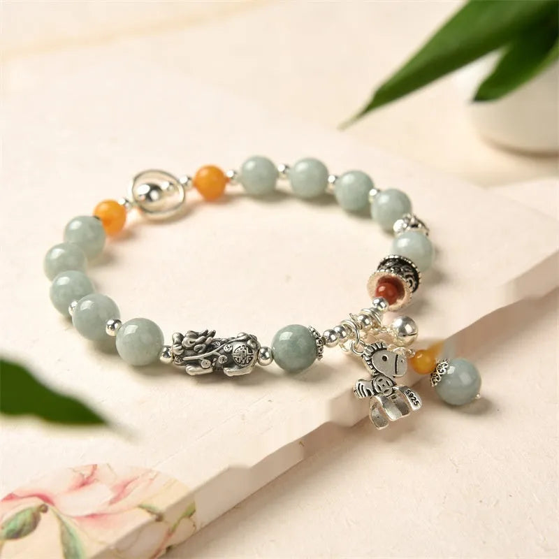Natural Grade A jade vintage bracelet with pony design and alloy clasp.