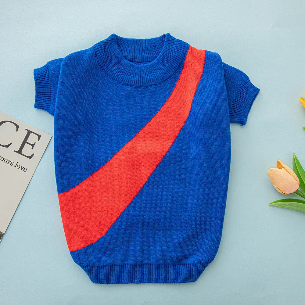 A wool casual jumper for corgis and poodles shown in sapphire blue, with size tags for XS S M L XL XXL.