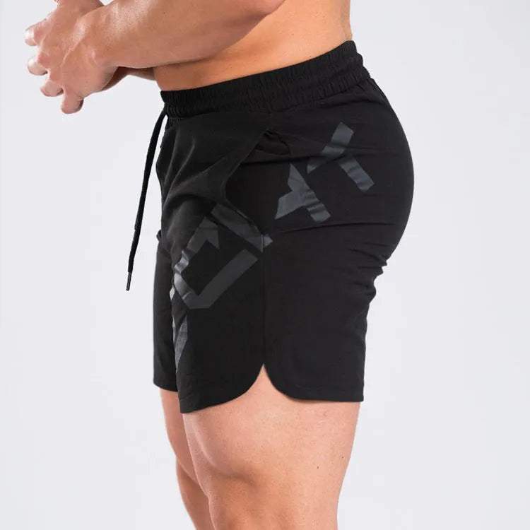 Men's elastic waist training running shorts in black with knee-length cut