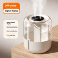 Beige round USB humidifier with dual spray nozzles, humidity display, and gear controls.