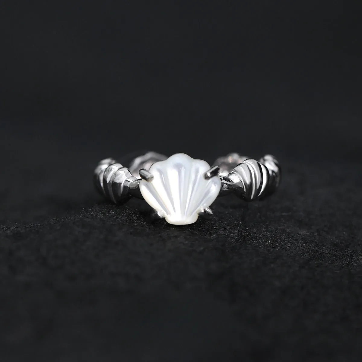Silver ring with shell tiger eye stone, adjustable opening, electroplated white gold finish side view