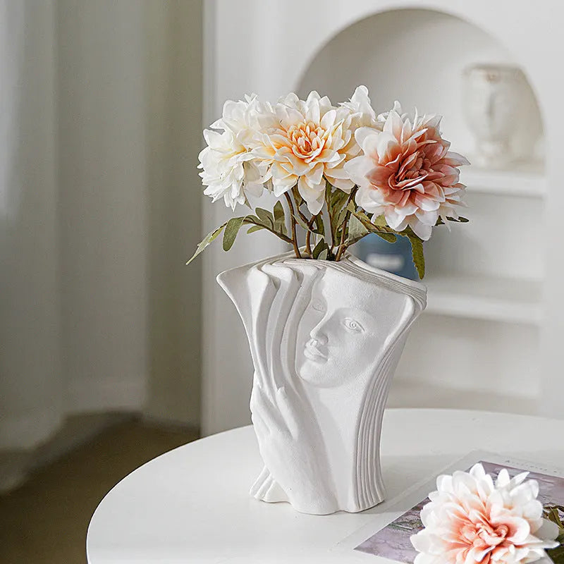 Ceramic book stand with hand-painted design for desk organisation
