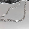 Men's hip hop diamond sweater chain in titanium steel with electroplated finish and Cuban link chain