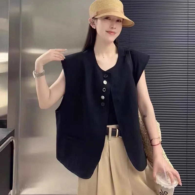 Women's loose fit polyester vest with pocket details in milky white colour