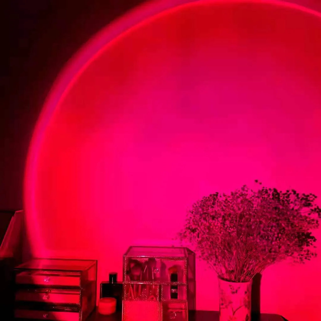 Sunset red rechargeable projection lamp showing rainbow colour light effects