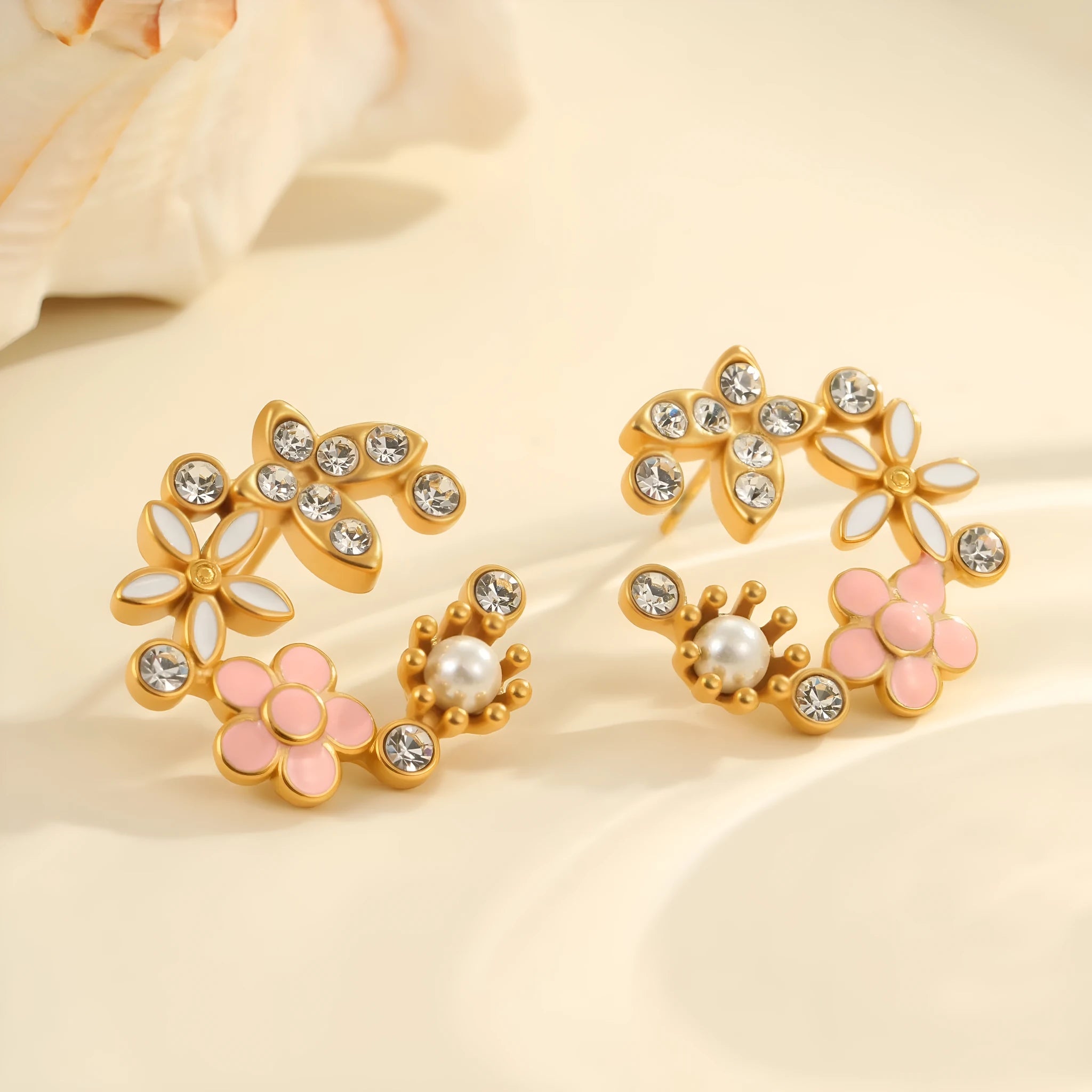 Flower petal stud earrings in 18K stainless steel with electroplated finish
