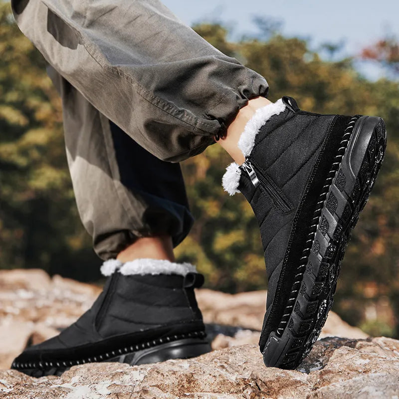 Men's plus size British-style snow boots in black with a cotton upper and flat rubber sole.