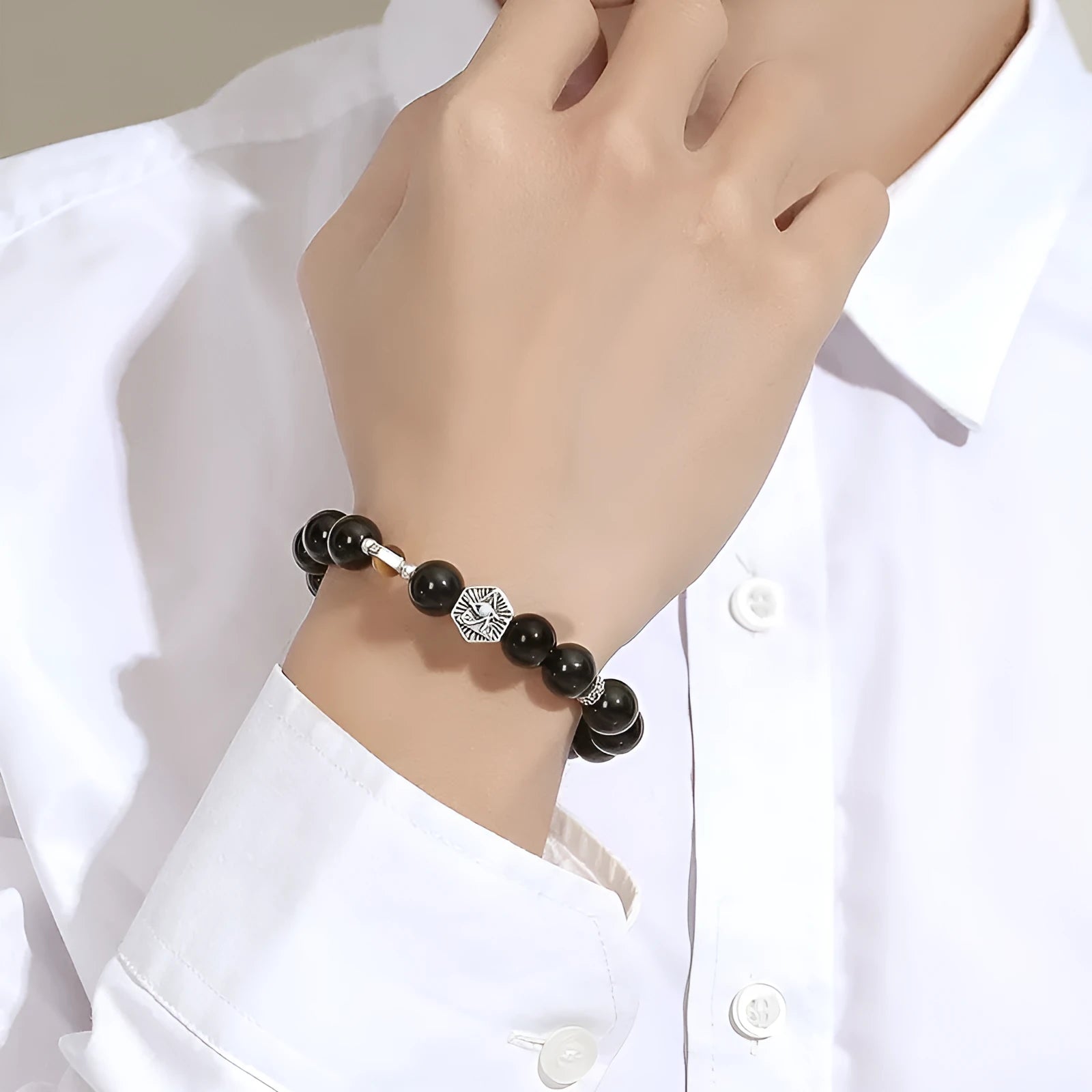 Men's God's Eye bracelet with 8mm obsidian beads and geometric silver design