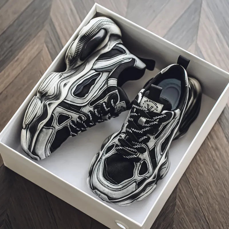 Men's black mesh sneakers with platform sole, lace-up front, and white rubber tread.