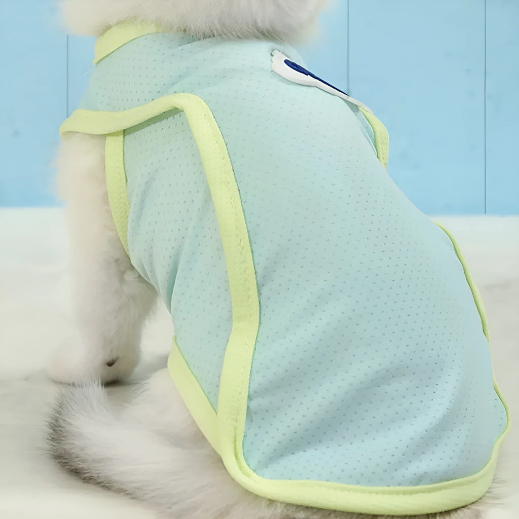 Light green polyester cat vest with a sports cut, shown on a feline model