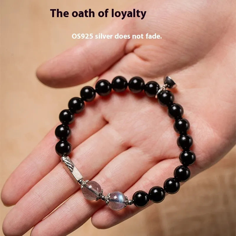 Obsidian Buddha beads couple bracelet set showing 8mm and 10mm bracelets in a national style.