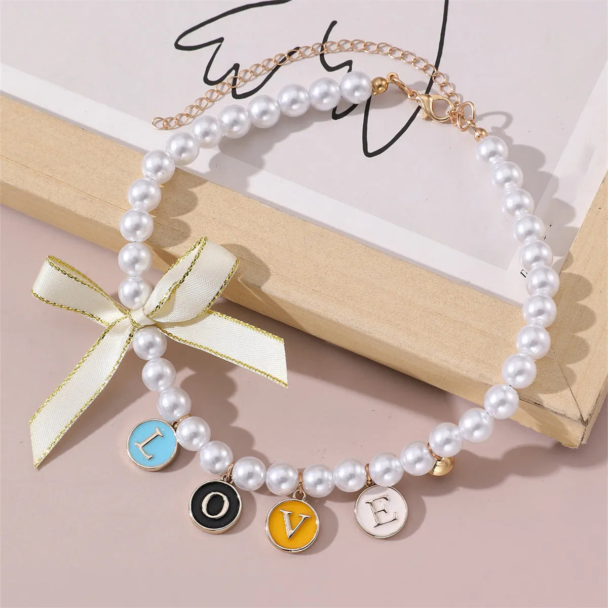Cartoon pattern pearl pendant pet necklace in black and white for small to medium pets