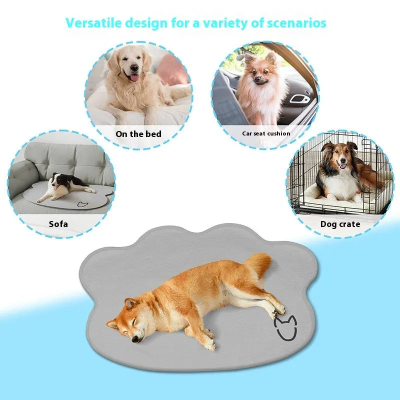 Dog head-shaped Ice Silk pet cooling mat on a hardwood floor, showing non-slip base and light gray colour.
