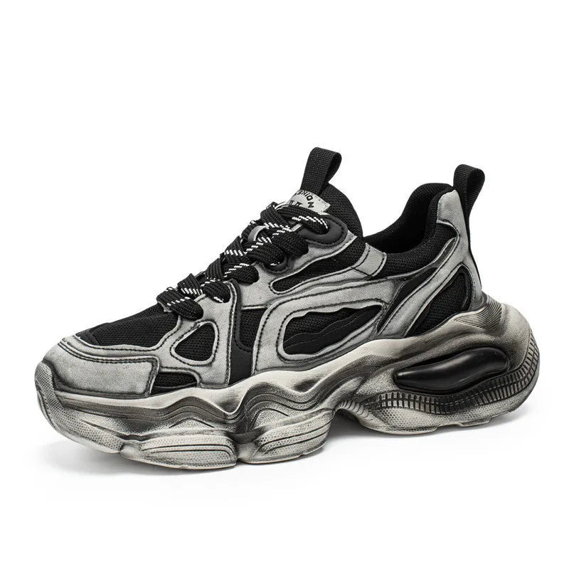 Men's black mesh sneakers with platform sole, lace-up front, and white rubber tread.