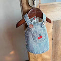 Pet denim skirt for small dogs and cats in dark blue colour, size L, on a white background