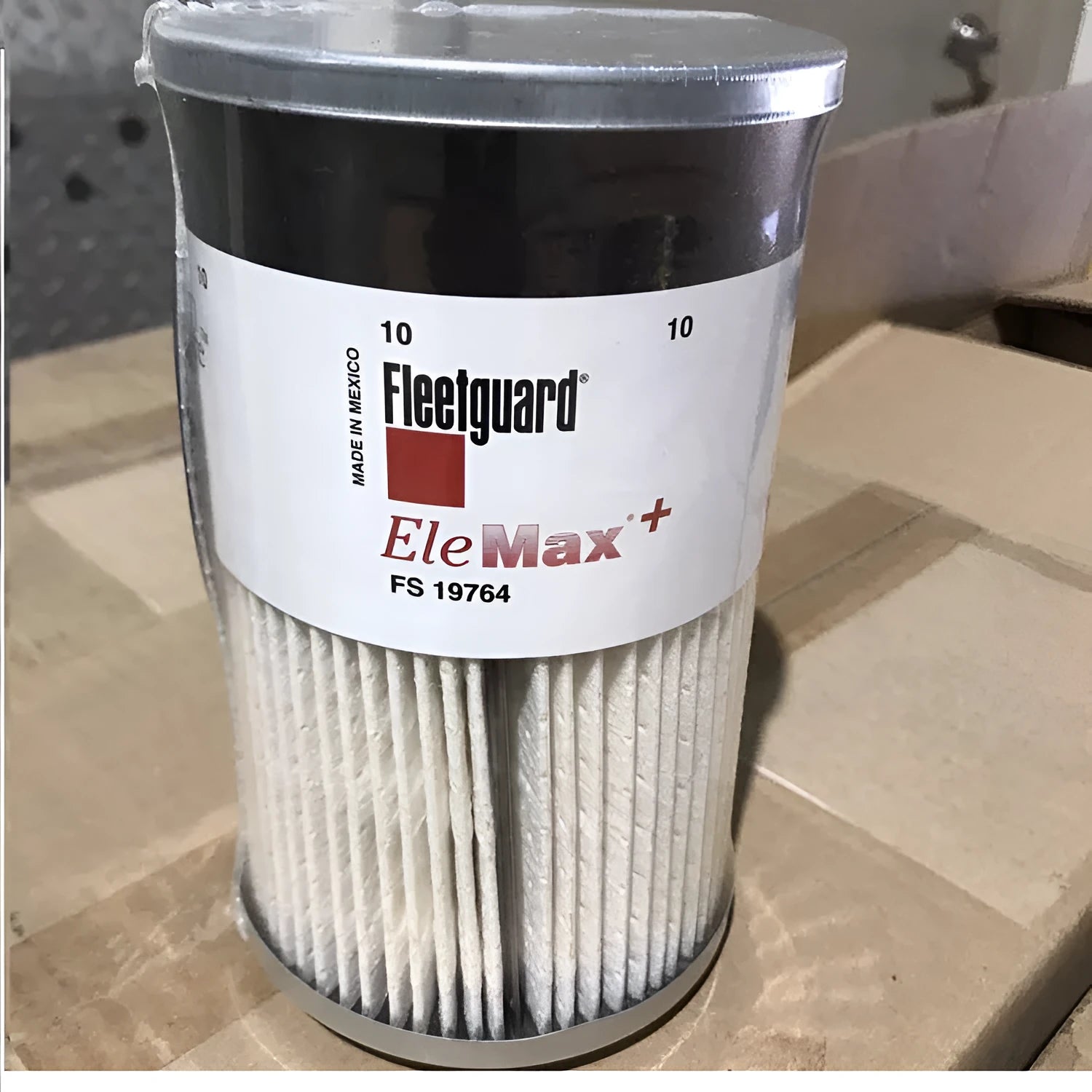 FS19764 diesel fuel filter for generator sets with 10mm inlet, outside diameter 106.93mm.
