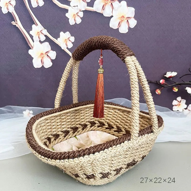 Hand-woven rustic straw storage basket in coffee brown colour.
