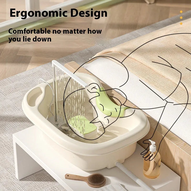 Light pink plastic shampoo basin for bed use with head pad, neck pillow, and water pump on bed