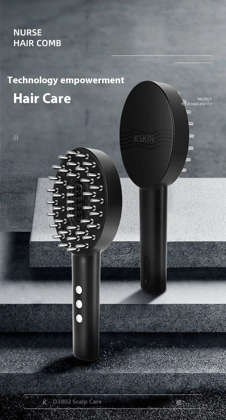 Black handheld scalp massage device with vibration function on a white background.