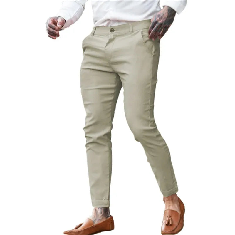 Men's slim fit cotton twill pencil trousers in various solid colours showing stretch fabric and zip fly detail