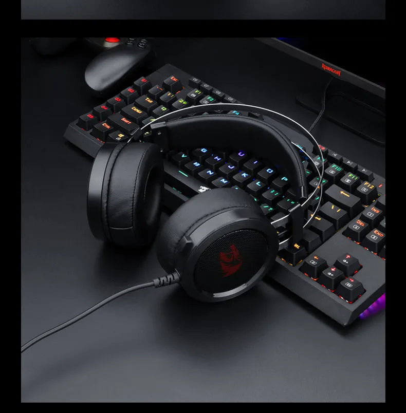 Black wired computer gaming headset with over-ear design and 3.5mm audio connector