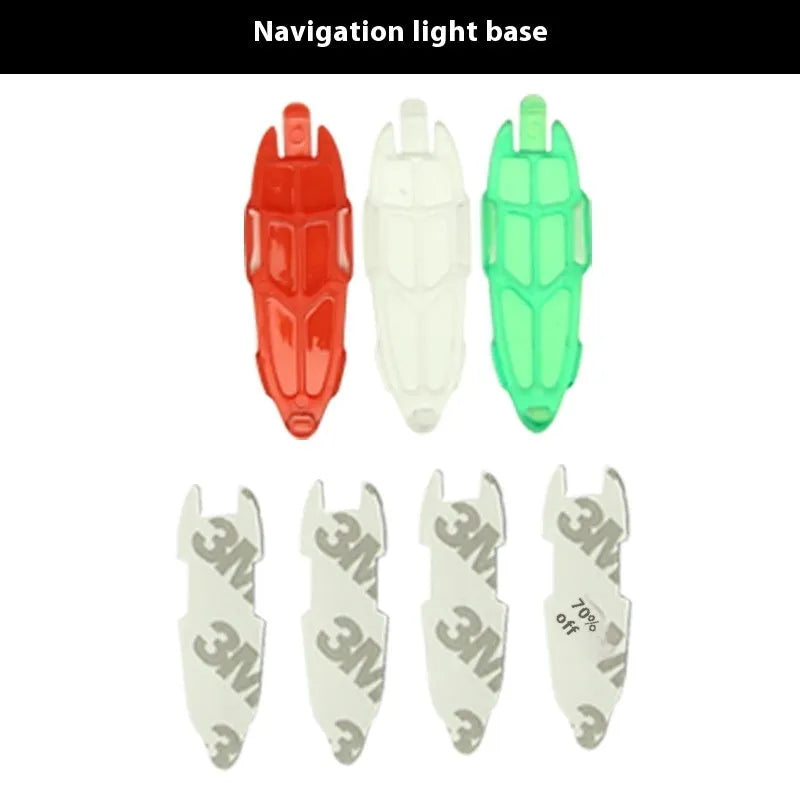 Three compact V3 wireless charging navigation lights with adhesive backing, shown in red, green, and white.