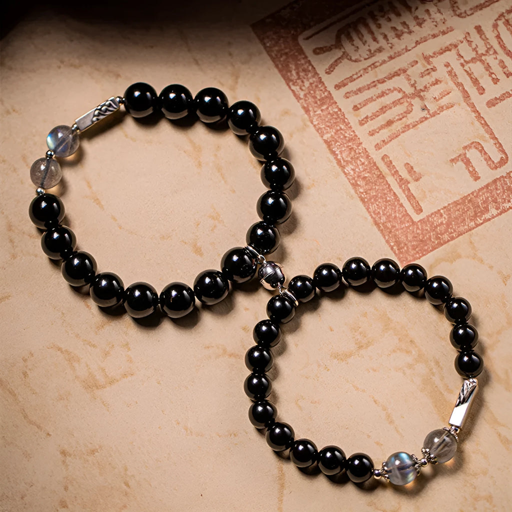 Obsidian Buddha beads couple bracelet set showing 8mm and 10mm bracelets in a national style.