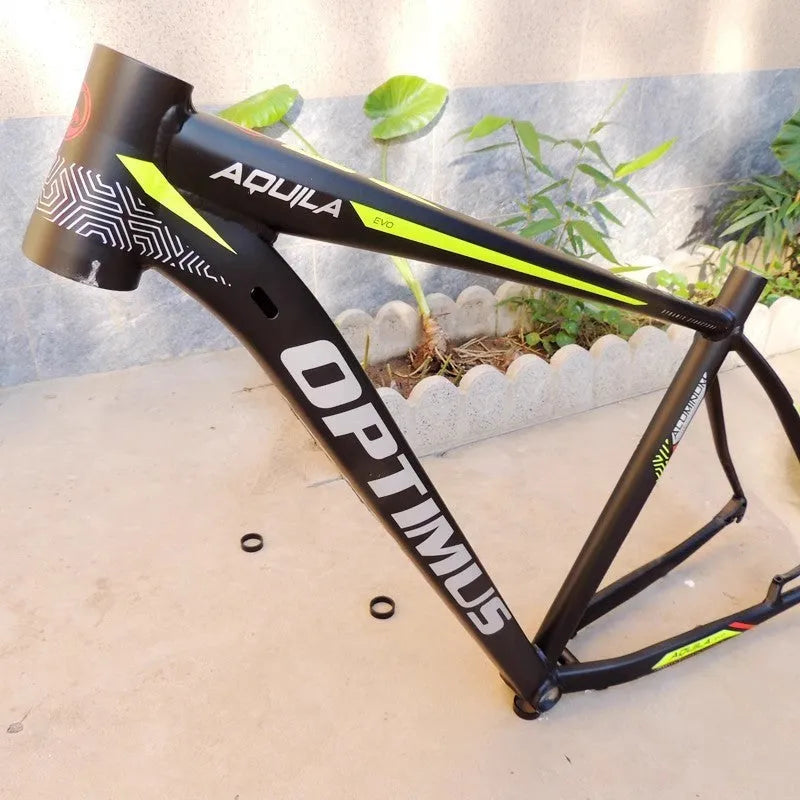 Black and green 29-inch aluminium mountain bike frame with internal cable routing