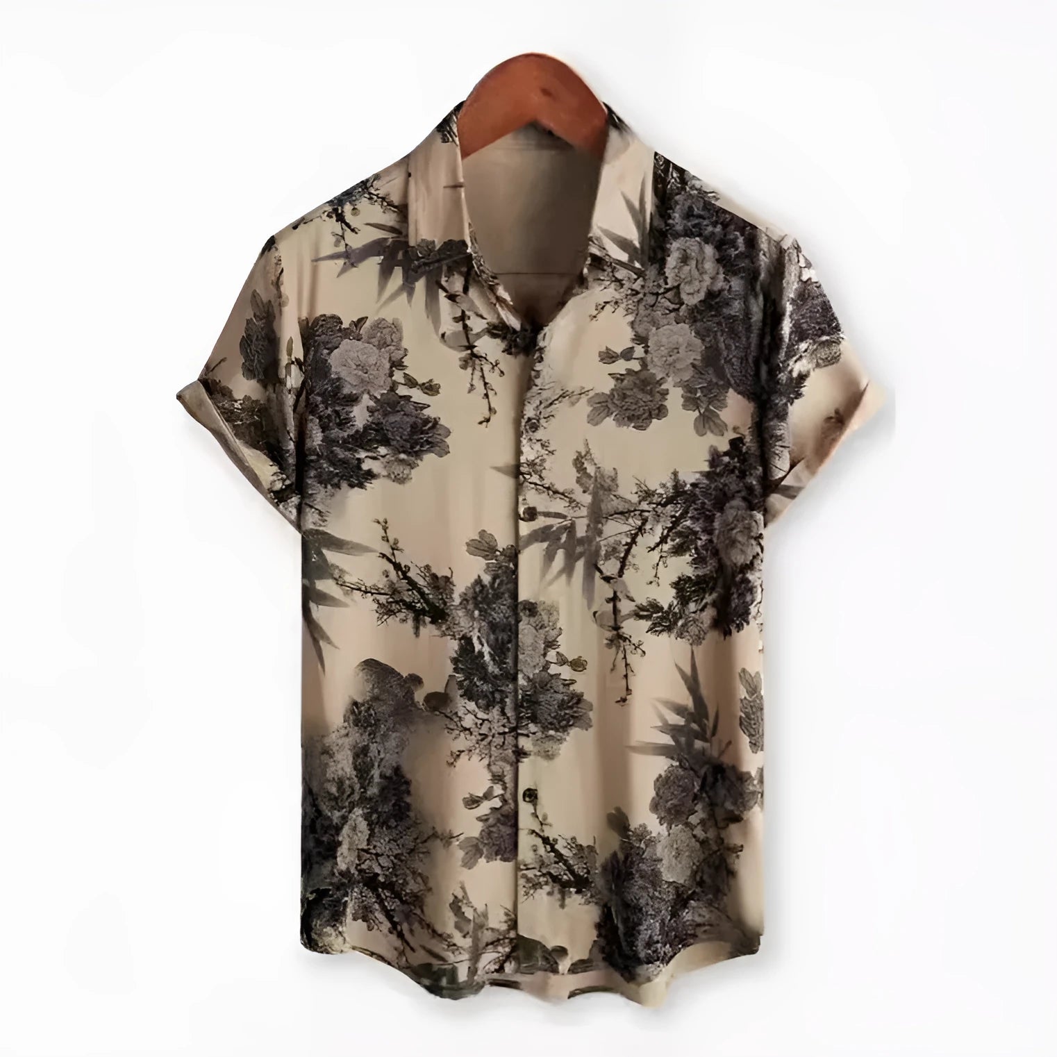 Man wearing a short sleeve Hawaiian shirt with a colourful floral print pattern.
