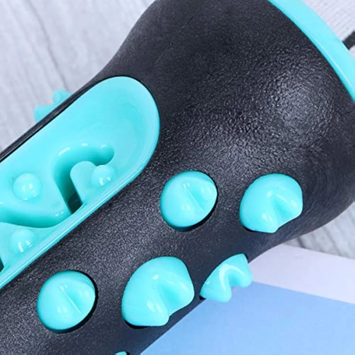 Natural rubber dog dental chew toy in blue colour with textured cleaning surfaces.