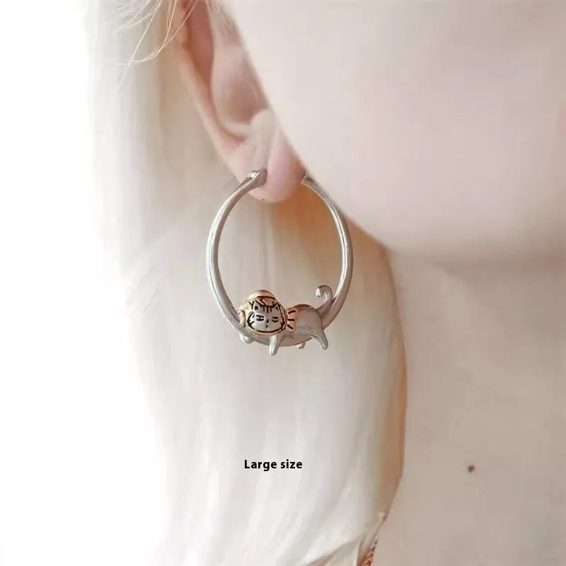 Pair of alloy cat earrings with electroplating finish in broken cat design, available in large and small sizes